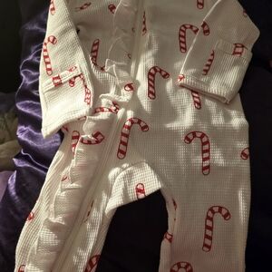 White Baby Onesie with Red Candy Cane Print